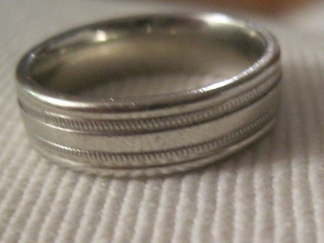 A color photo of Jay Sennett’s silver wedding ring