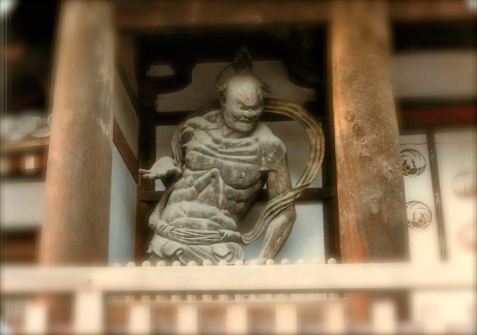 Photo of a devil outside a buddhist temple