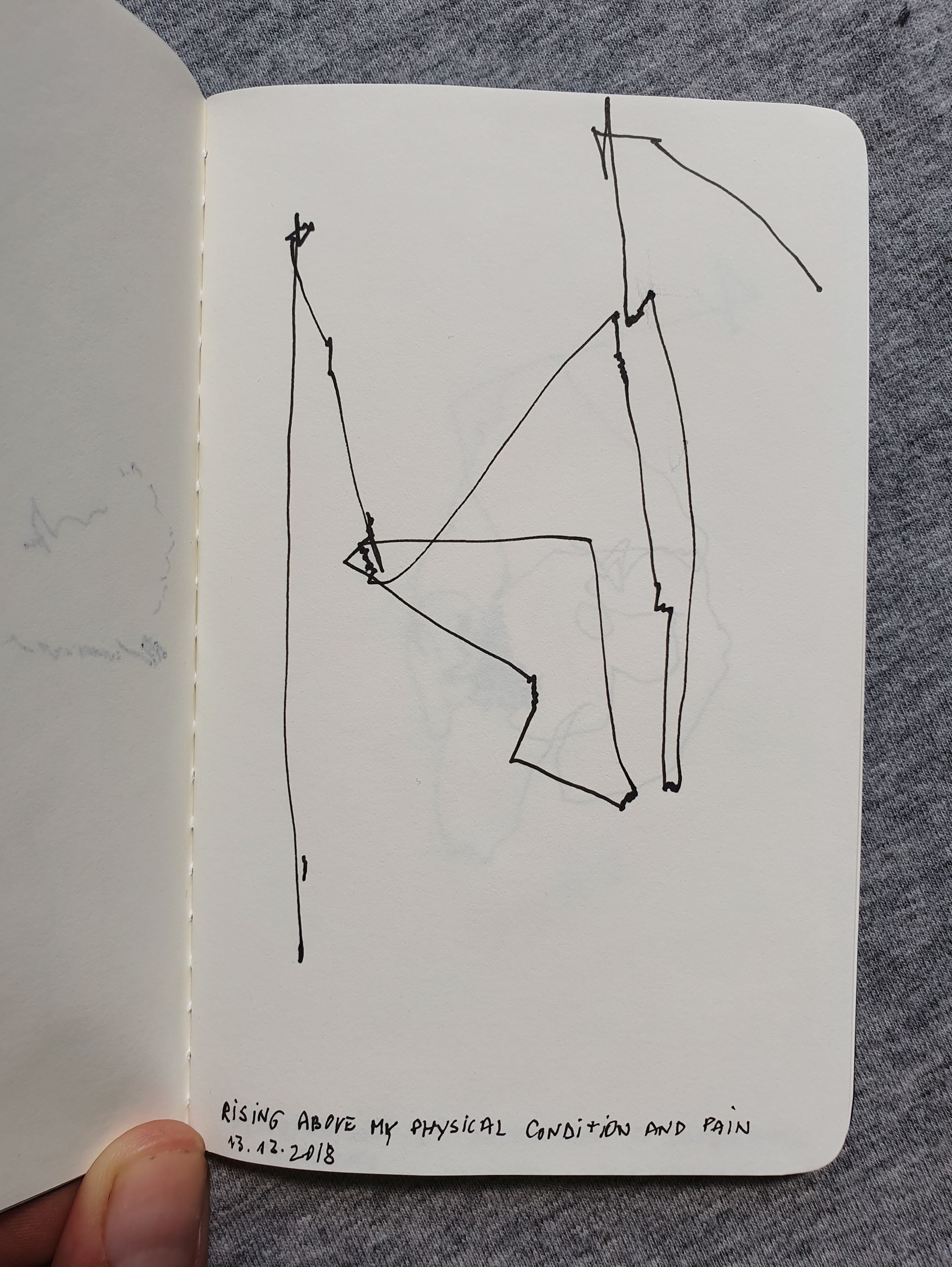 Drawing with Eyes Closed Notebook on Chest
