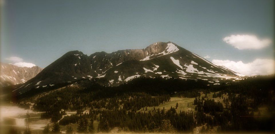 Antiqued color photo of Mt. Arkansas